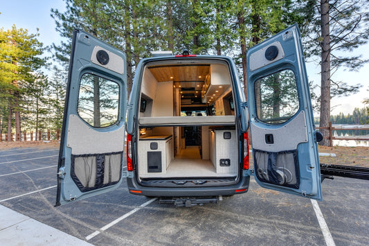 the back of a van with its doors open