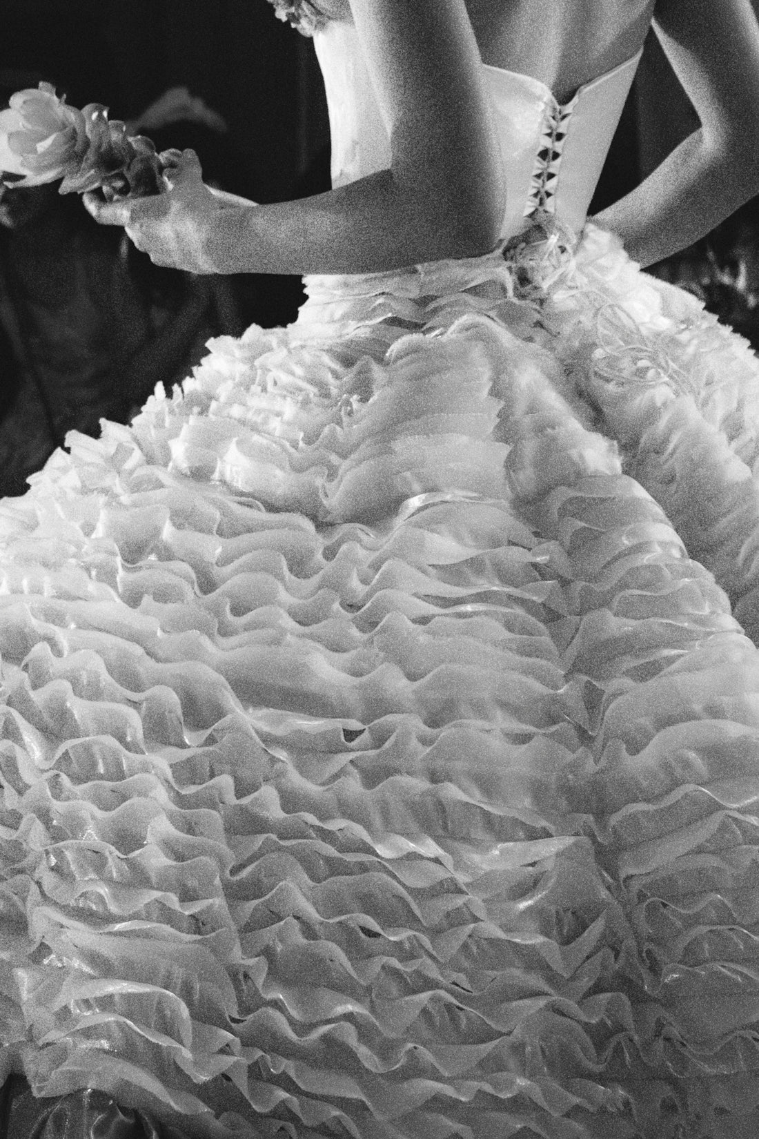 Bride in a ruffled wedding dress