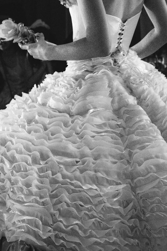 Bride in a ruffled wedding dress
