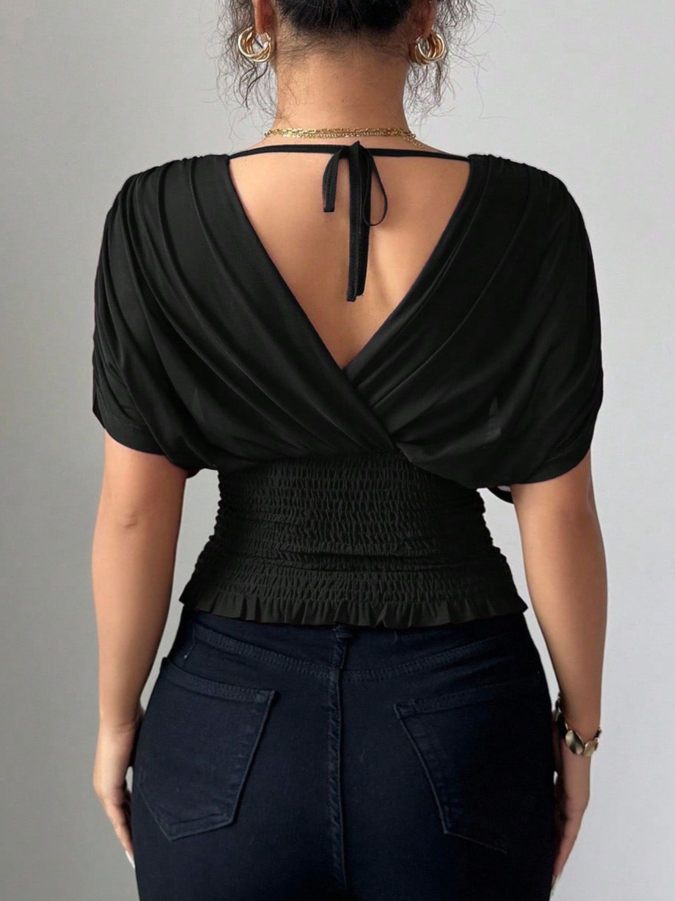 Ruched Surplice Short Sleeve Top by Trendsi